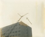 Placing the Cross on top of the Hospital, 1959 by Advocate Aurora Health