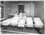 Nurses with Infants in the Nursery, 1926 by Advocate Aurora Health
