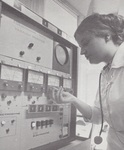 Nurse checking cardiac monitoring equipment, 1974 by Advocate Aurora Health