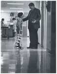 Chaplain with Pediatric Patient, 1983 by Advocate Aurora Health