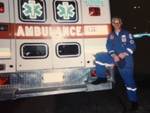 EMT with ambulance by Advocate Aurora Health