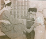 Nurse with patient by Aurora Health Care